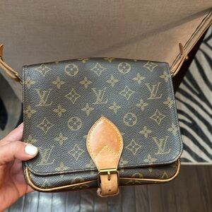Authentic Louis Vuitton malletier crossbody, leather and canvas.
